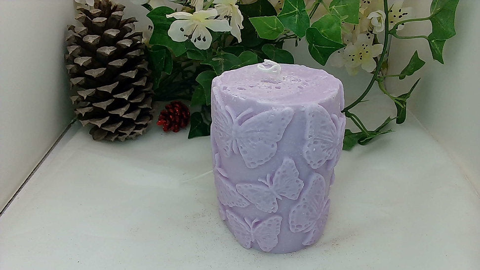 An elegant butterfly soy candle infused in clean cotton lavender