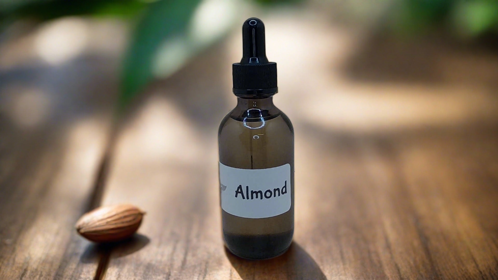 a bottle of almond oil sitting on a wooden table1621243260e1af0c20-2