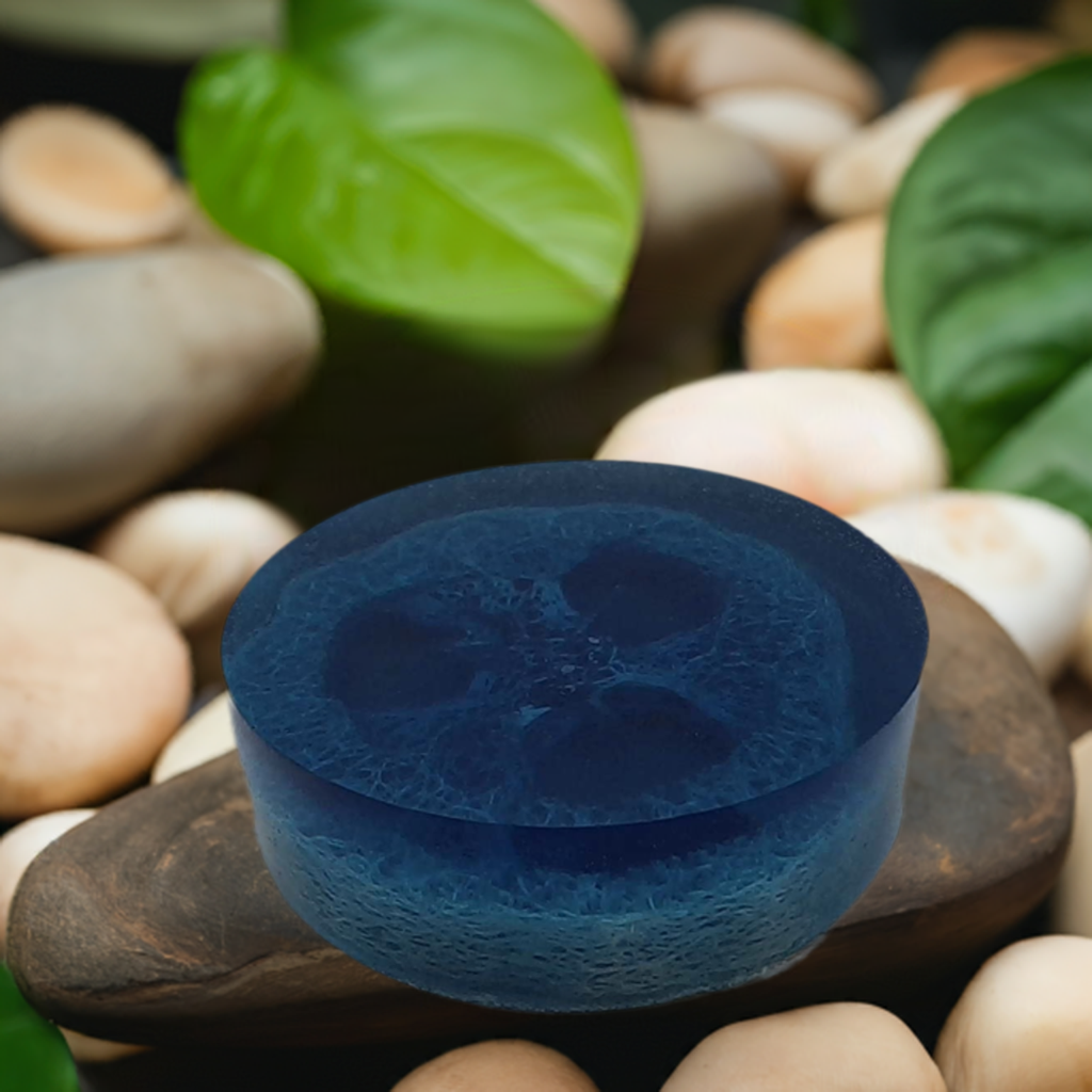 a blue soap sitting on top of a pile of rocks