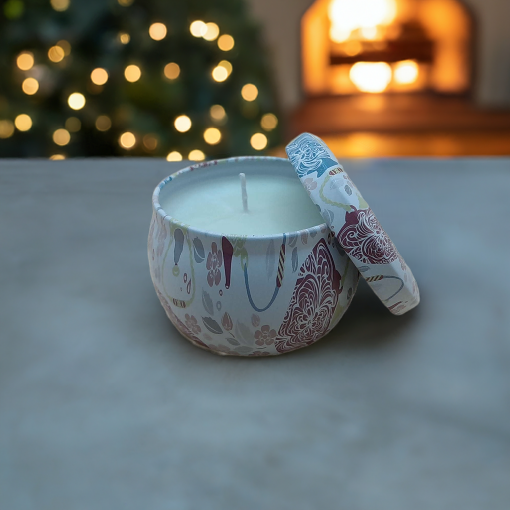 A candle sitting on a wooden table with Christmas tree in the backgroundslider_item_GDVFeQ