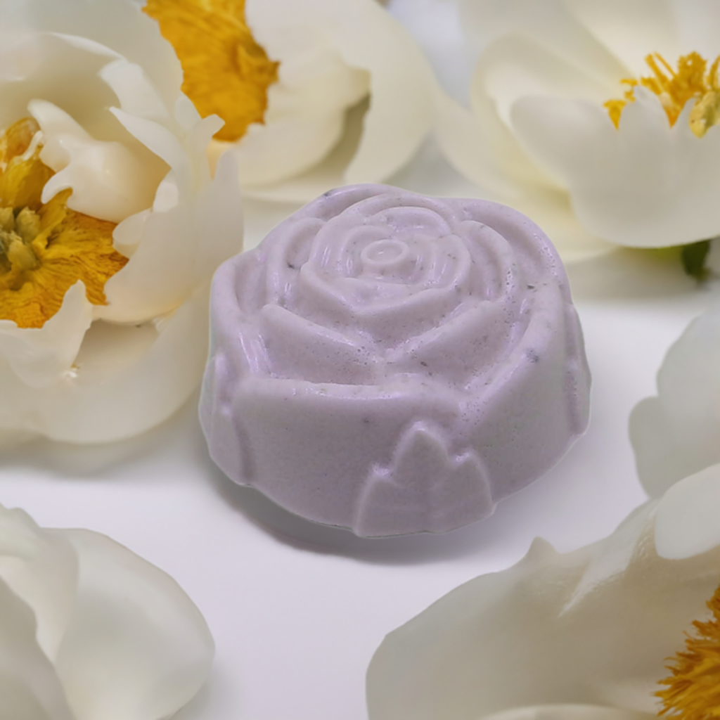 a close up of a soap on a white surface