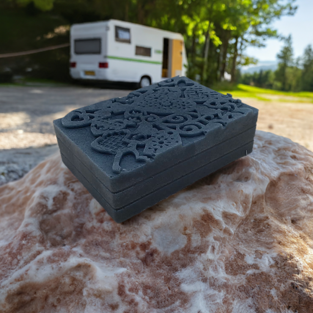 a box sitting on top of a rock